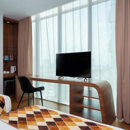 Cambridge Hotel Medan Extérieur photo