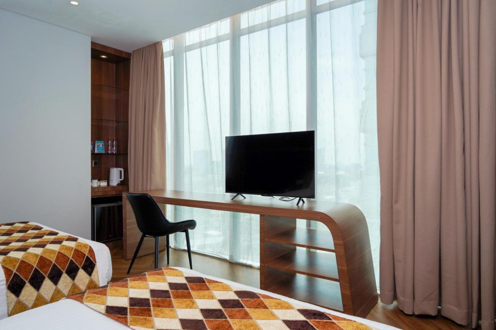Cambridge Hotel Medan Extérieur photo